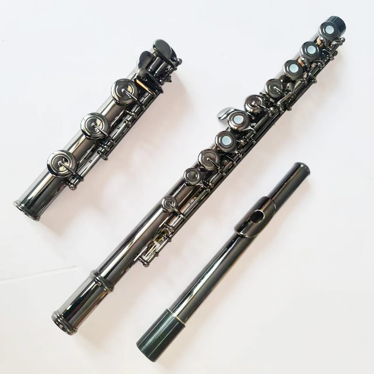 

New Popular Black Nickel Plated Flute Instrument Stylish and Versatile Musical Tool