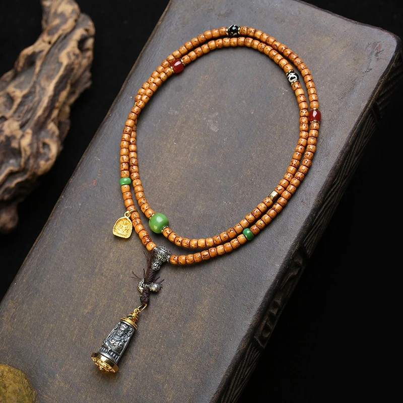 

Tibetan Heavenly Iron Yellow God of Wealth Pendant Sweater Chain Tibetan Pine Stone Agate God of Wealth Tianzhu Star Moon Bodhi