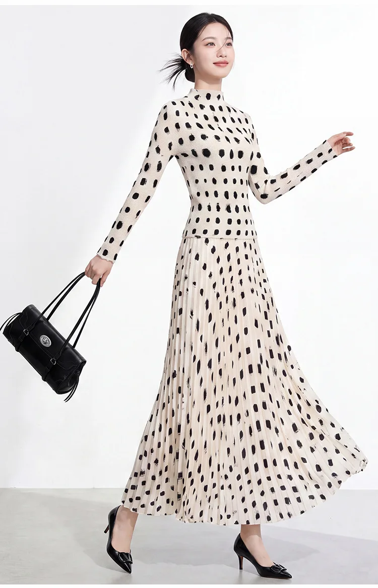 High-end two-piece set: stylish polka dot long-sleeved base layer top with high-waisted pleated skirt; chic Miyake two-piece set
