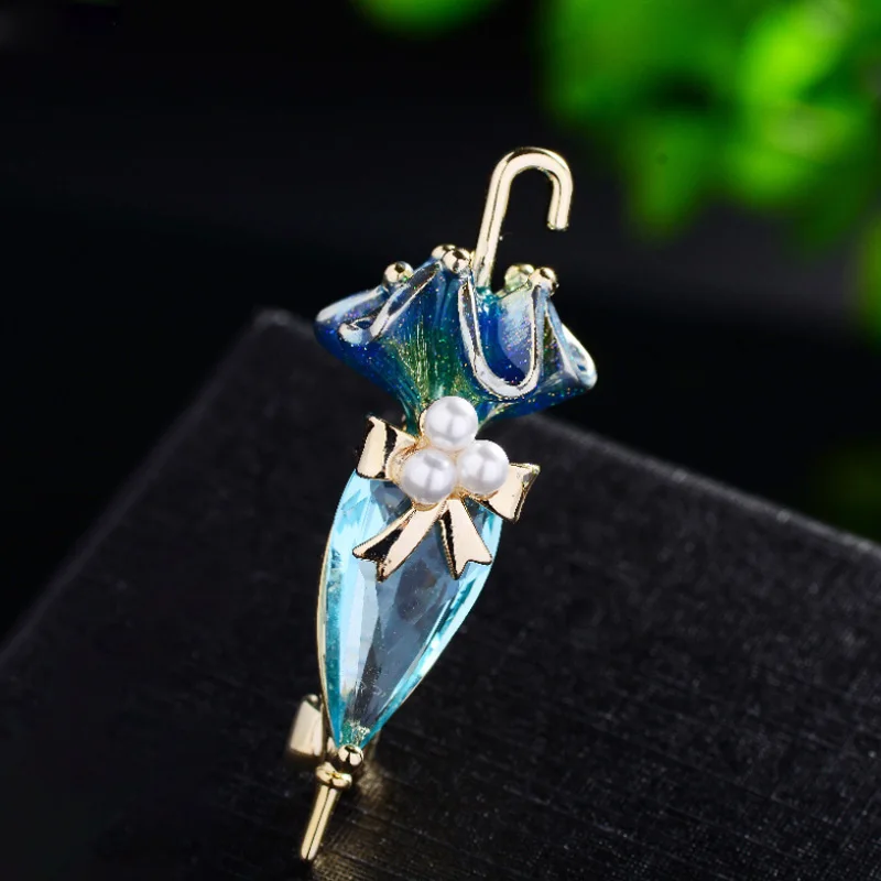 

Fashion Enamel Titanium Steel Micro-Inlaid AAA Colored Zircon Umbrella Brooch Luxury Retro Pearl Pin.