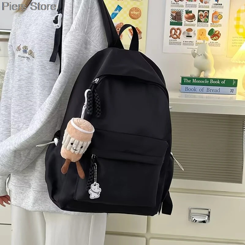 

Student Japanese large-capacity backpack Girl simple and versatile backpack Unisex polyester material Doll decoration