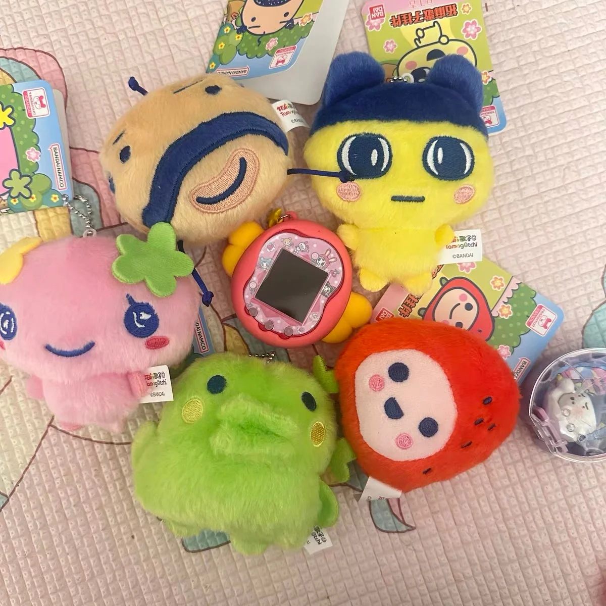 ทามาก็อตจิ บันได มากาตชิ ฟุราอัตชิ ตุ๊กตาอิเล็กทรอนิกส์  กระเป๋าใส่หูฟัง ตุ๊กตาขนนุ่ม ของเล่นน่ารัก กระเป๋าเก็บของเล็กๆ ของตกแต่ง ของขวัญ ของเล่น