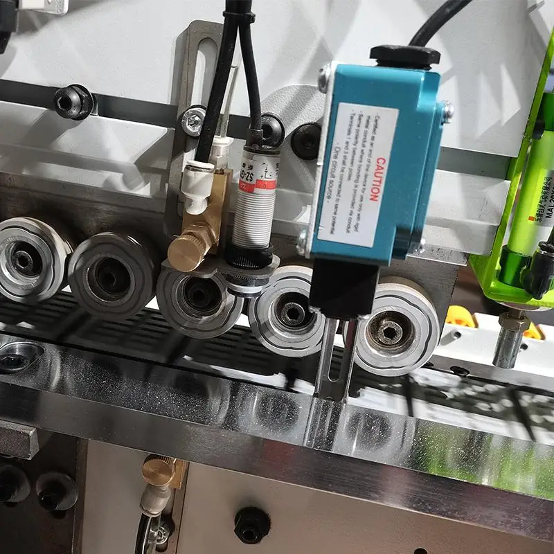 Edge banding machine travel switch limiter