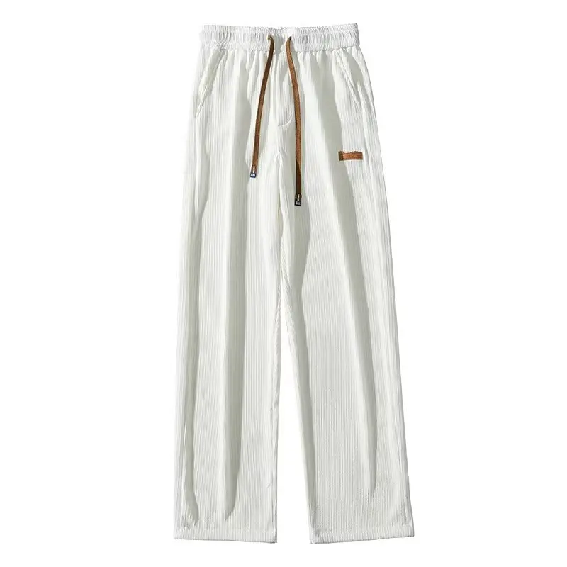 بنطلون رياضي أبيض للرجال صيفي فضفاض مستقيم الساق بنطلون طويل للشباب للربيع والخريف متعدد الاستخدامات من الحرير الصناعي عصري و...