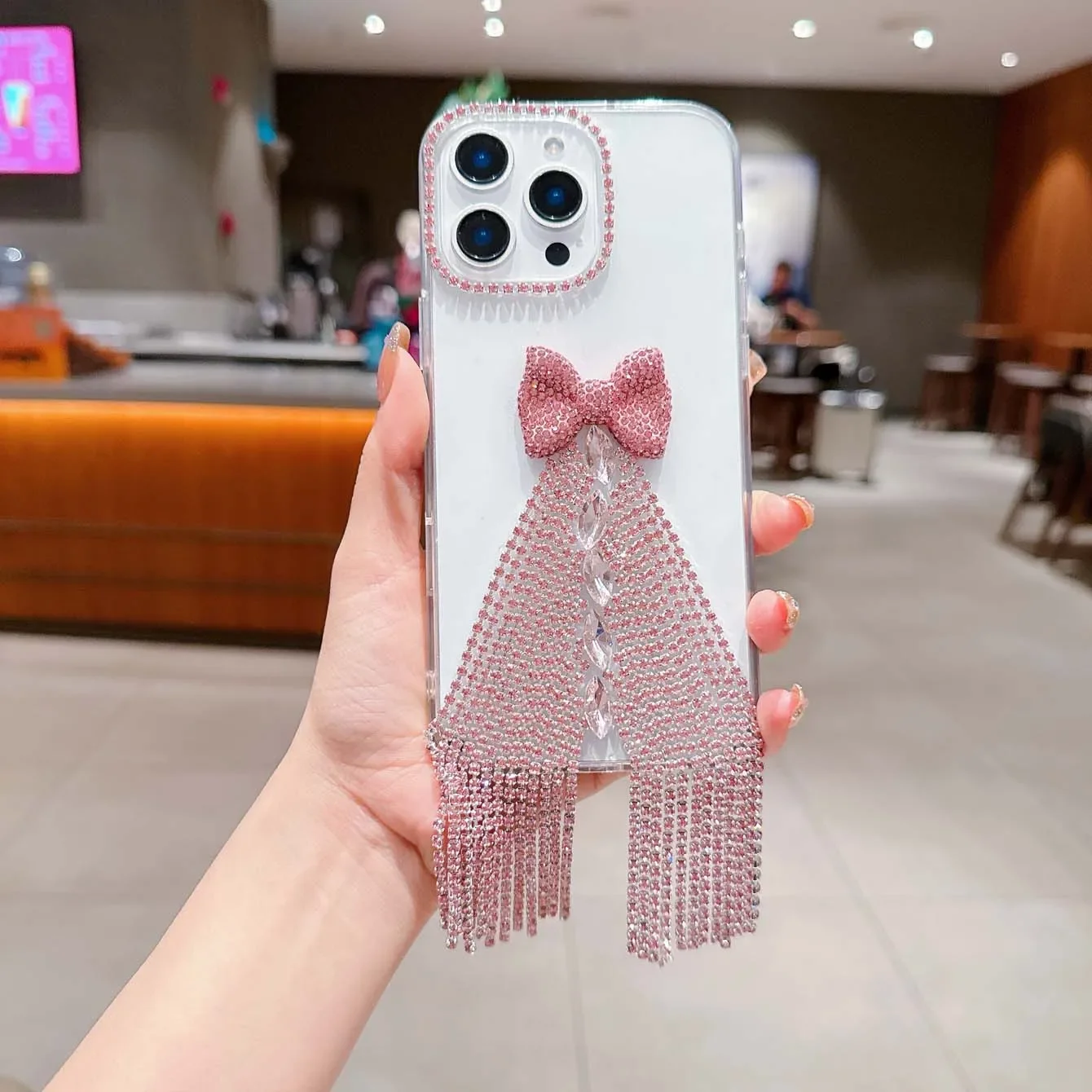 A niche luxury full diamond fringe bow rhinestone for iPhonexxs 11 1213 14 15 16 pro and promax series phone cases