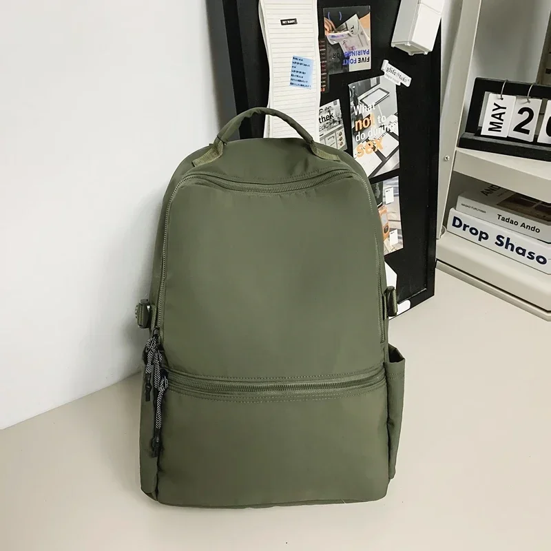 

Casual Large Capacity Bags Zipper Nylon Solid Color Backpacks 2024 Softback Solid Hot Selling Interior Compartment School Bags