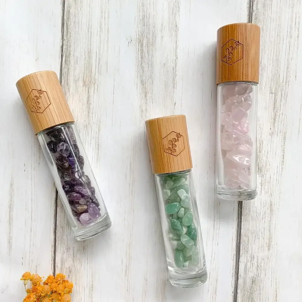 

hot sale Engraving logo Bamboo Lid Refillable Spray Bottle Massage Roll On Glass Bottles Essential Oil Fragrant Roller Bottle