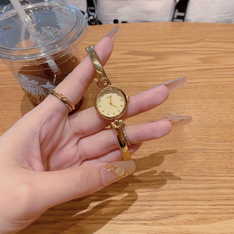New simple temperament small gold watch fashionable versatile women's hand watch small exquisite water luxury quartz watch gift