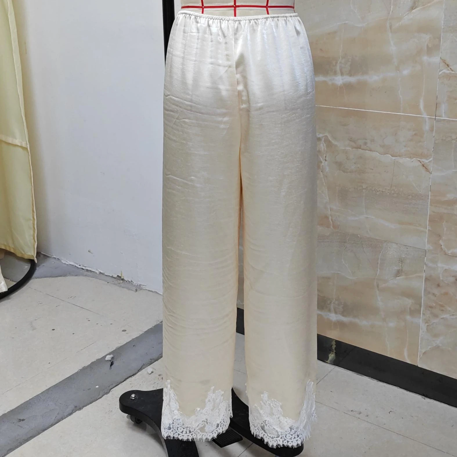 Calças soltas de retalhos de renda feminina de luxo moda casual cor sólida cintura elástica calças largas perna