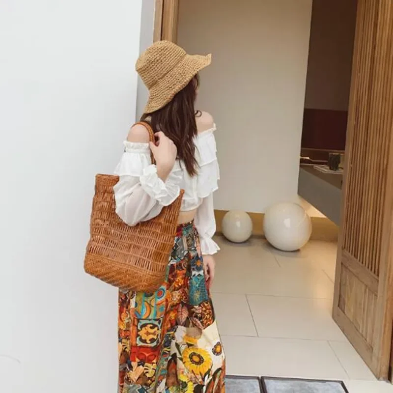 Yao Dong novedad de verano elegante bolso tipo cesta de verduras bolso de cuero hueco Cuero de vaca japonés bolso a rayas tejido a mano vacaciones femeninas