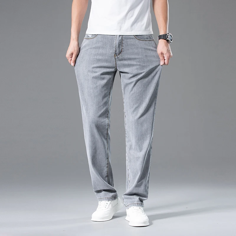 Jeans Lyocell da uomo ultrasottili estivi pantaloni Casual da lavoro dritti larghi pantaloni in Denim di marca grigio fumo con drappeggio morbido