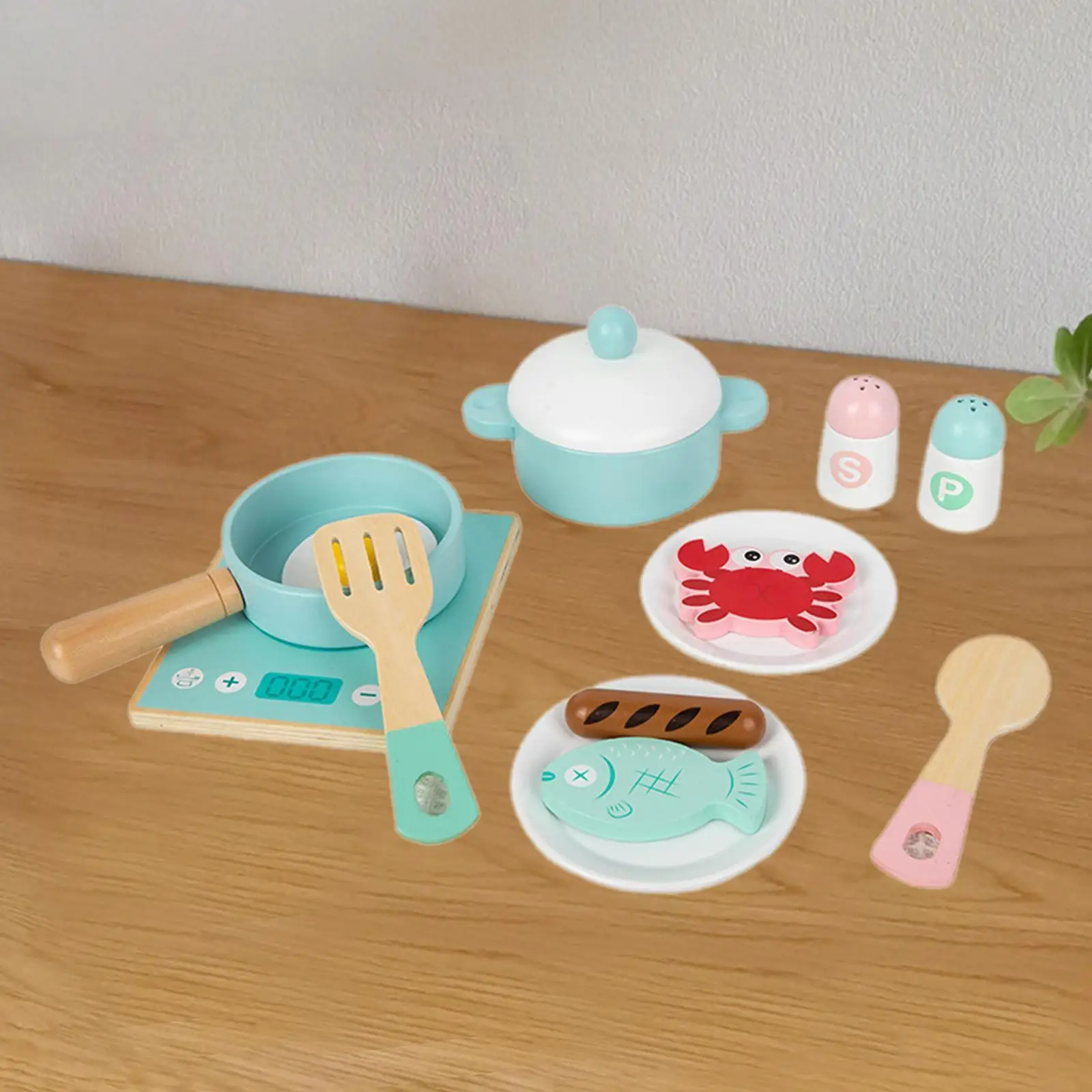 Conjunto de cozinha infantil com ferramentas de cozinha e itens alimentares