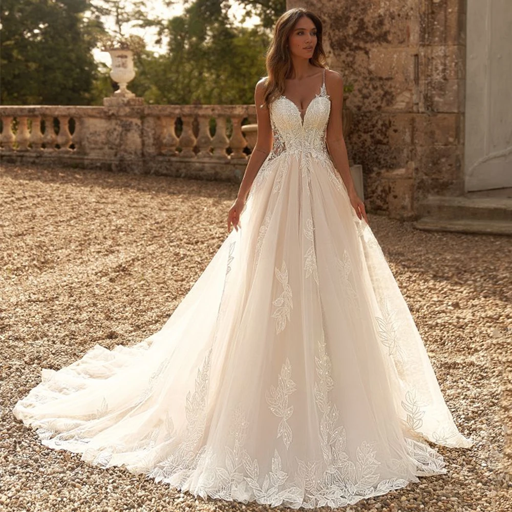 Abiti da sposa caldi Cinghie per spaghetti personalizzate Scollo a V Backless Scintillanti Paillettes Applique Sweep Train Abiti da sposa