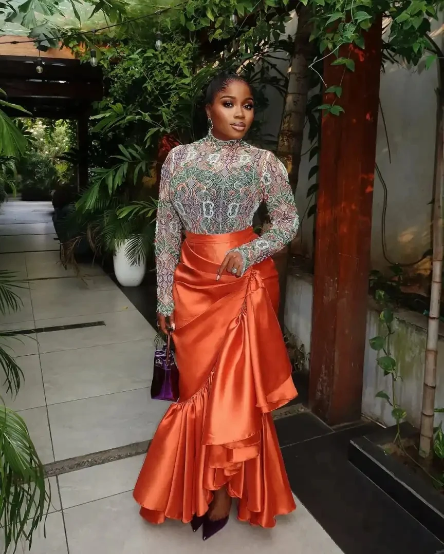 تنورة امرأة أنيقة بسحاب عالي الخصر بطول الأرض تنورة طويلة حورية البحر مع تنورة برتقالية ثنيات طراز جديد للسيدات