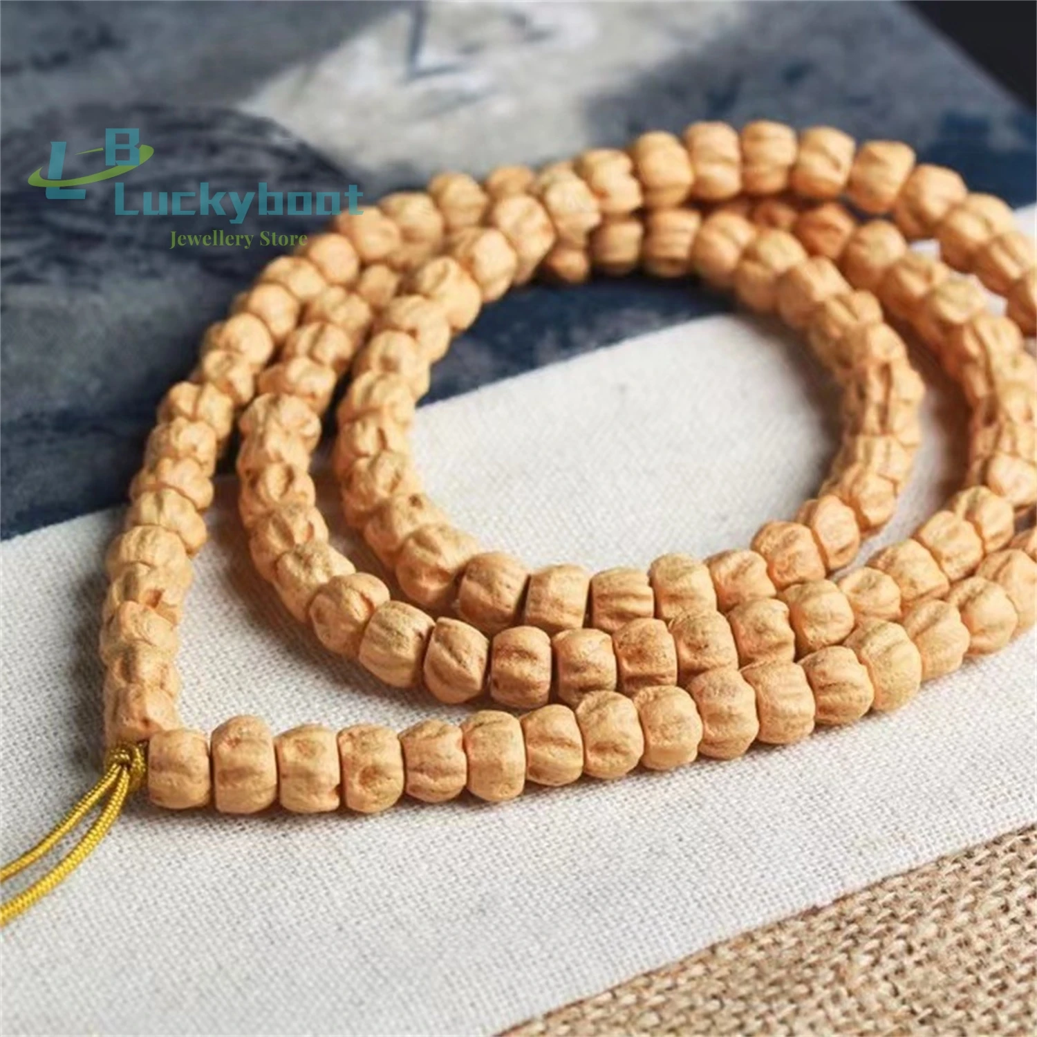 Natural Butter Skin Smooth Pattern Hand Bracelet with 108 Fragrant Seeds Buddha Beads for Men and Women\'s Multi Loop Bracelet