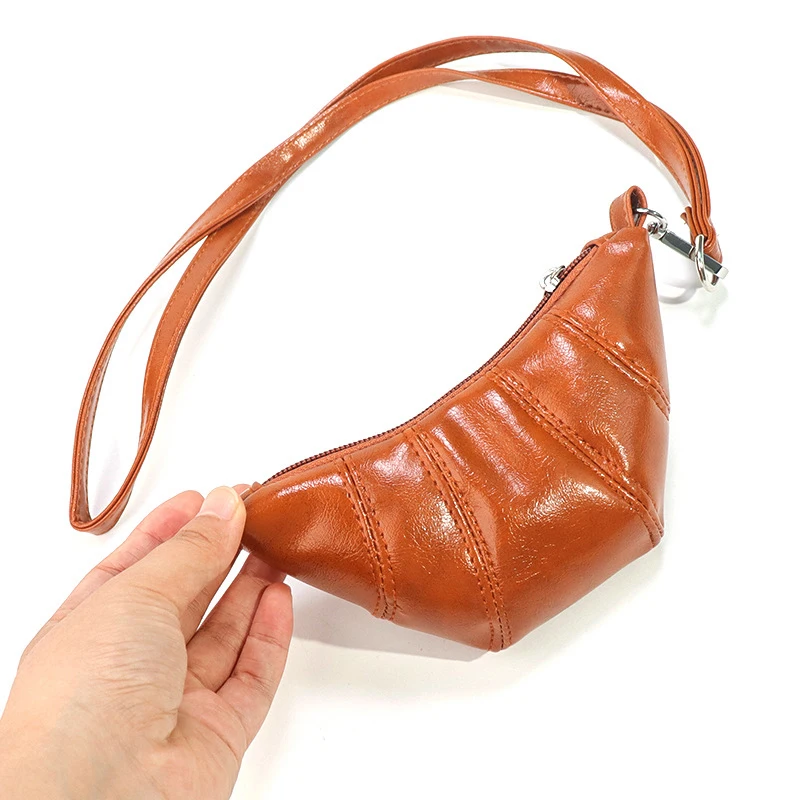 Mini portamonete semplice alla moda con collo appeso, design carino croissant, mini borsa per auricolari con rossetto a tracolla di nicchia