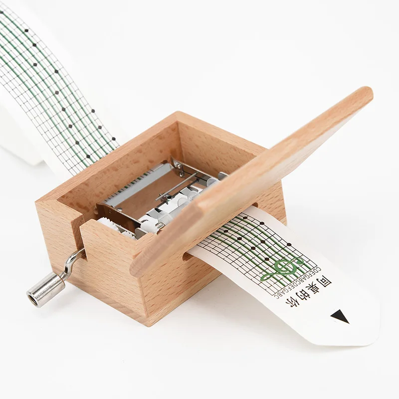 DIY Wooden Music Box with Hand Crank Hole Puncher and Paper Tapes for Creative Music Programming and Interactive Use