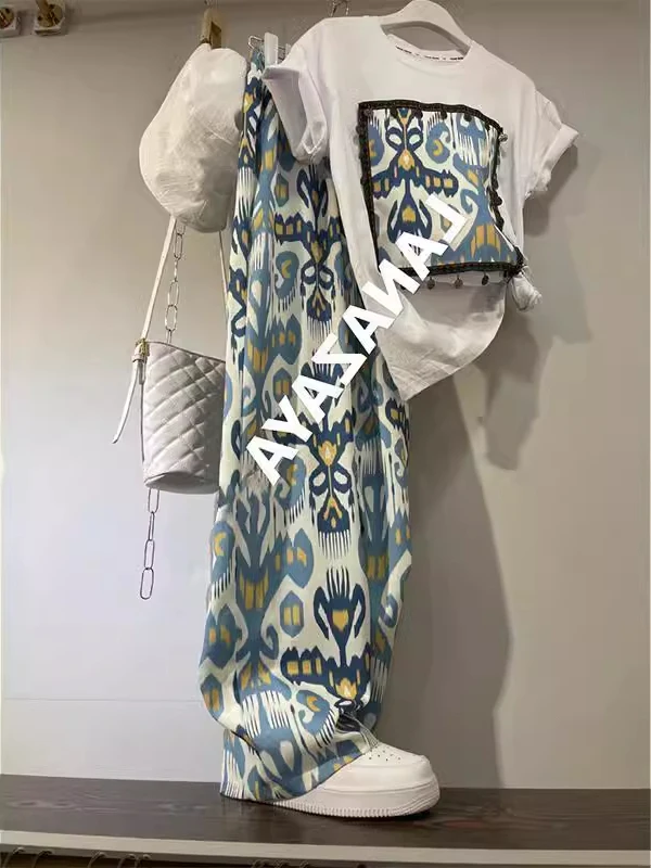 

Комплект из двух предметов: модные брюки свободного кроя (прямые или широкие) с этническим принтом, размер 300, для мужчин и женщин, парный комплект