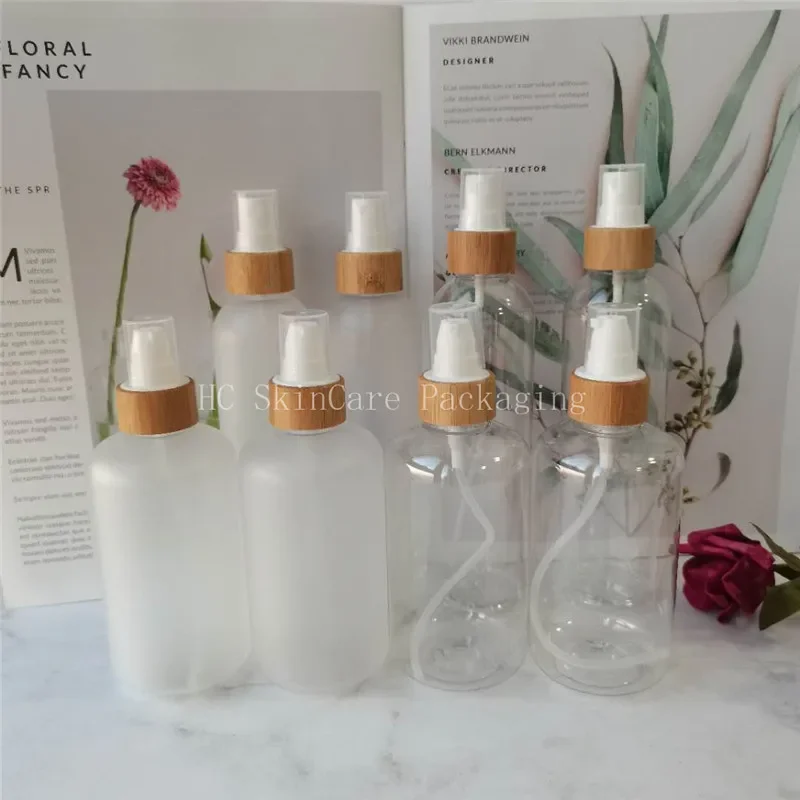 

wholesale cosmetic containers Empty frosted /clear plastic bottle with bamboo cap and plastic cream jar,clear clean bottles