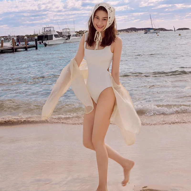 

Новый женский купальник в корейском стиле: чисто белый, милый, сексуальный, с открытой спиной, минималистичный, с эффектом пуш-ап, скромный, на бретелях, с двойными лямками, цельный.