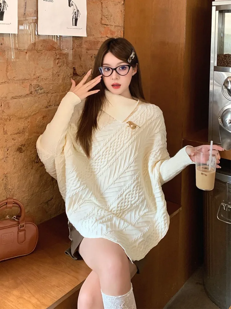 Autunno e inverno Nuovo design coreano Collo alto irregolare Torsioni di pasta fritta Mantello Maglieria Celebrity Street Maglione a maniche lunghe