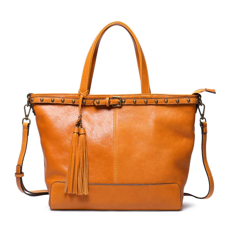 

Женская сумка из натуральной воловьей кожи, с кисточкой