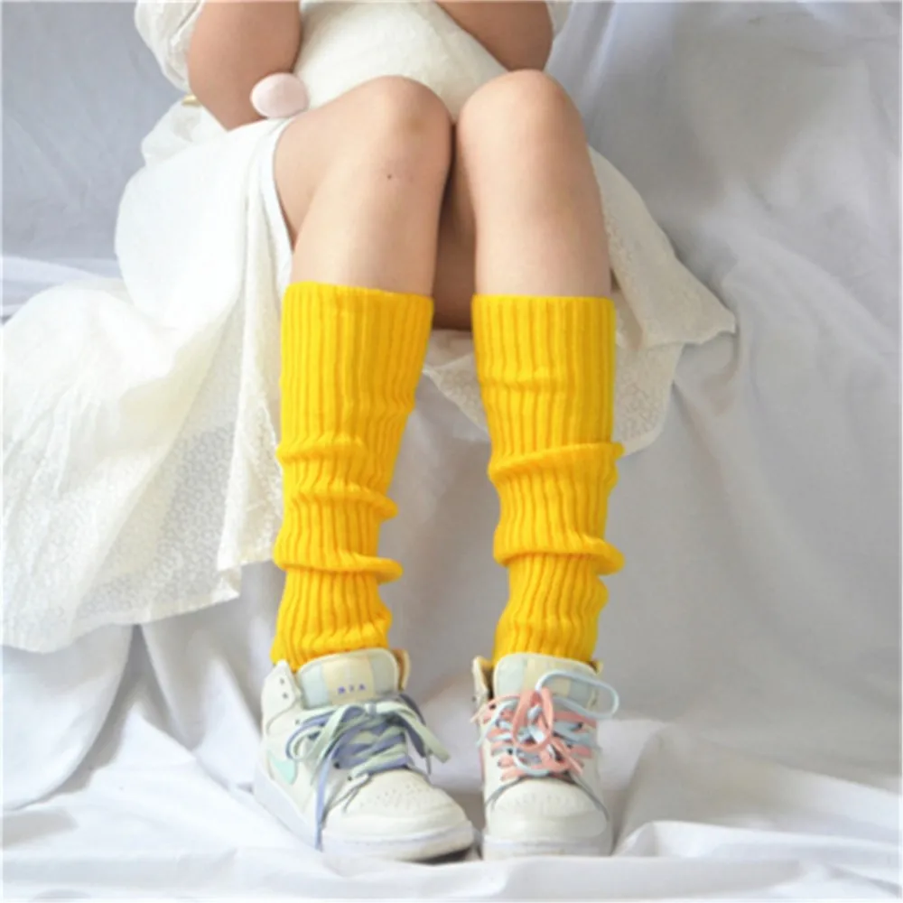 Multicolored women's colored wool leg covers solid color Joker knitted foot covers keep warm and pile socks boots.