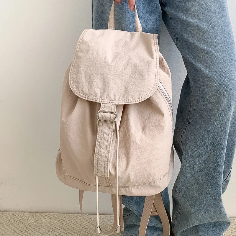 

Women's Lightweight Washed Canvas Drawstring Backpack Flap Top Handle Casual Daypack for Travel & Daily Wear
