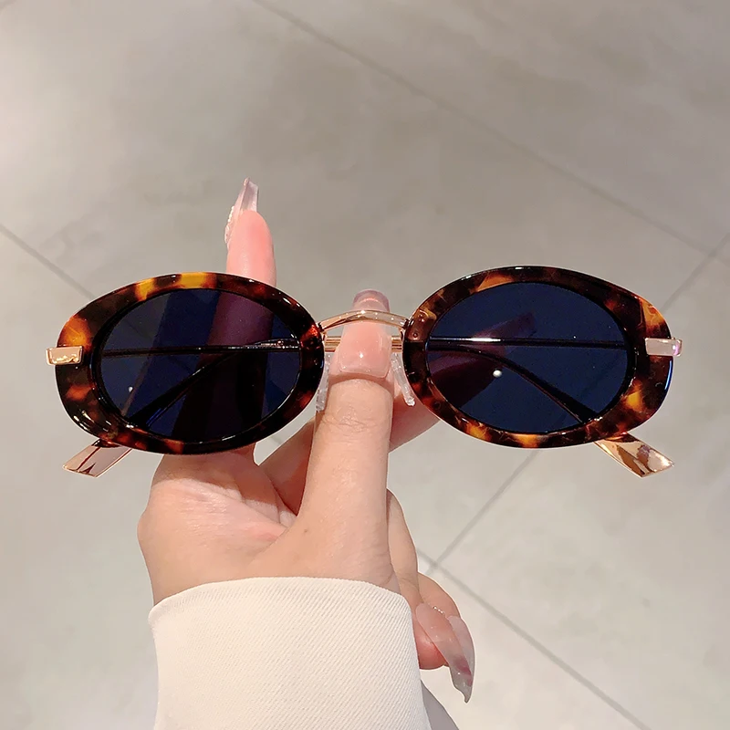 KAMMPT luksusowe metalowe designerskie odcienie Retro owalne damskie trendy okulary przeciwsłoneczne moda marka Leopard okulary przeciwsłoneczne plażowe dla pani