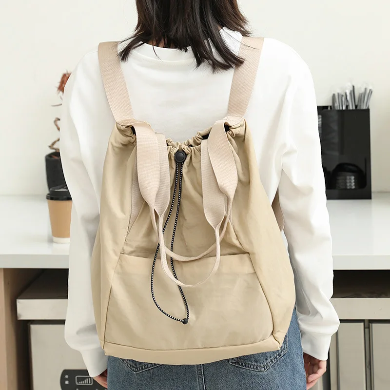 

2026 Повседневная парусиновая женская сумка на одно плечо, модная плиссированная сумка на шнурке, популярный нейлоновый рюкзак большой вместимости