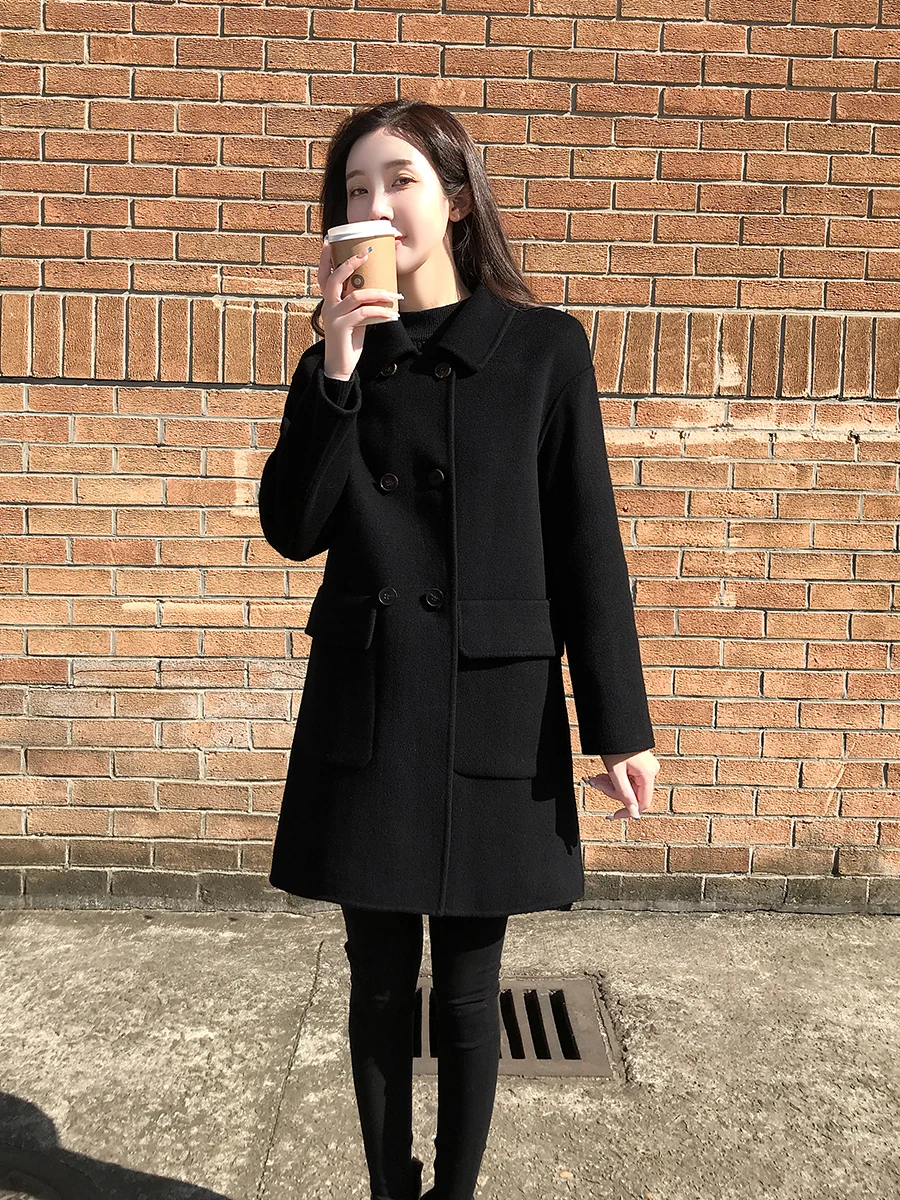 معطف كشمير على الوجهين للنساء الصغيرات لخريف وشتاء 2024 معطف صوفي جديد من الصوف الأسود متوسط الطول مع ملمس راقي