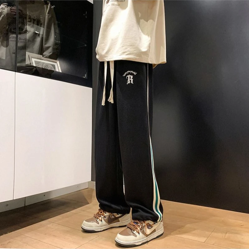 

Черные мужские брюки из вафельной ткани, тонкие летние повседневные брюки прямого кроя с эластичными манжетами на шнурке, свободный крой, уличный стиль