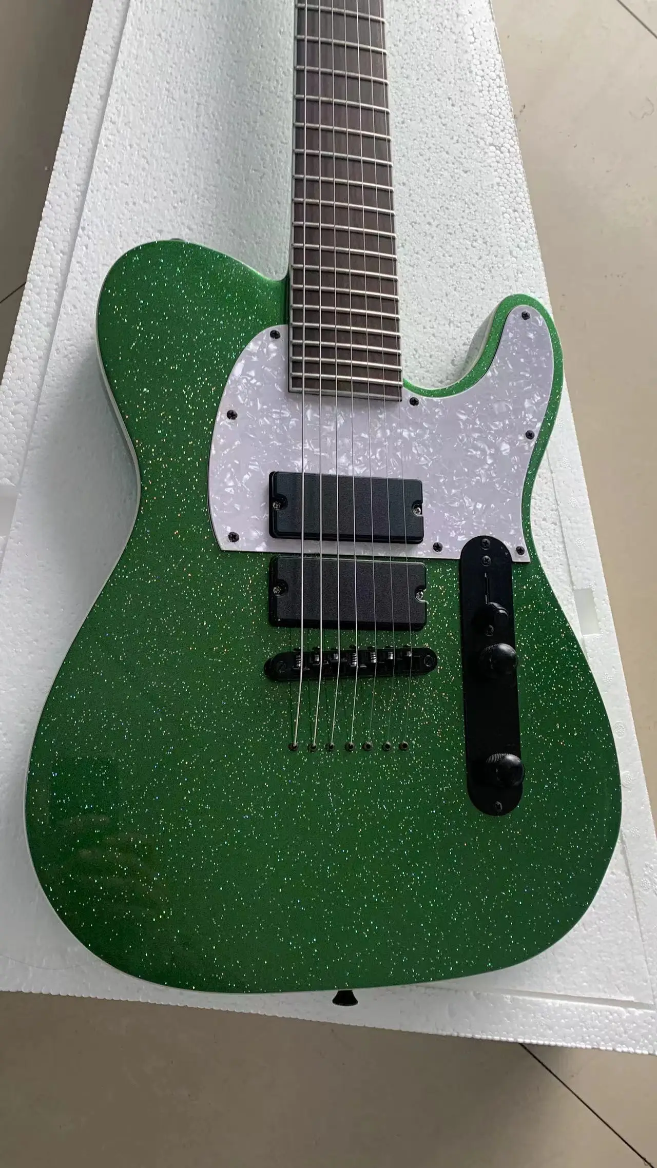 Factory manufacturing high-grade 7 string electric guitar, large particle 7 color sequin green, free mail