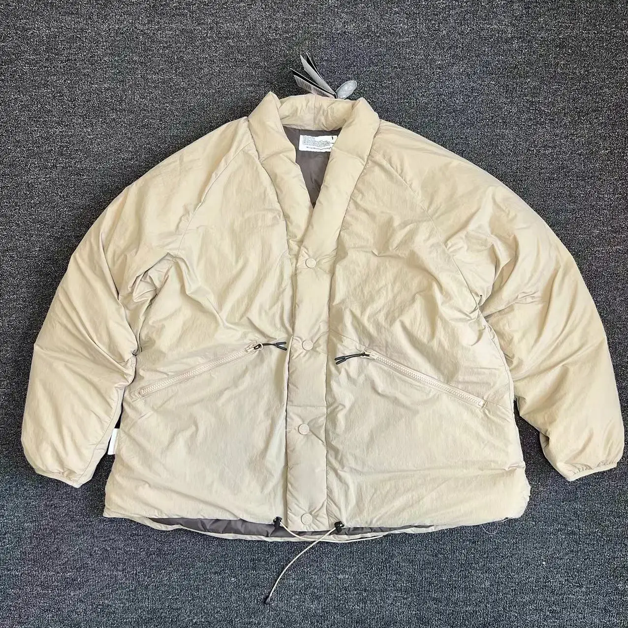 

WHITE MOUMTAINEERING x MADNESS down jacket
