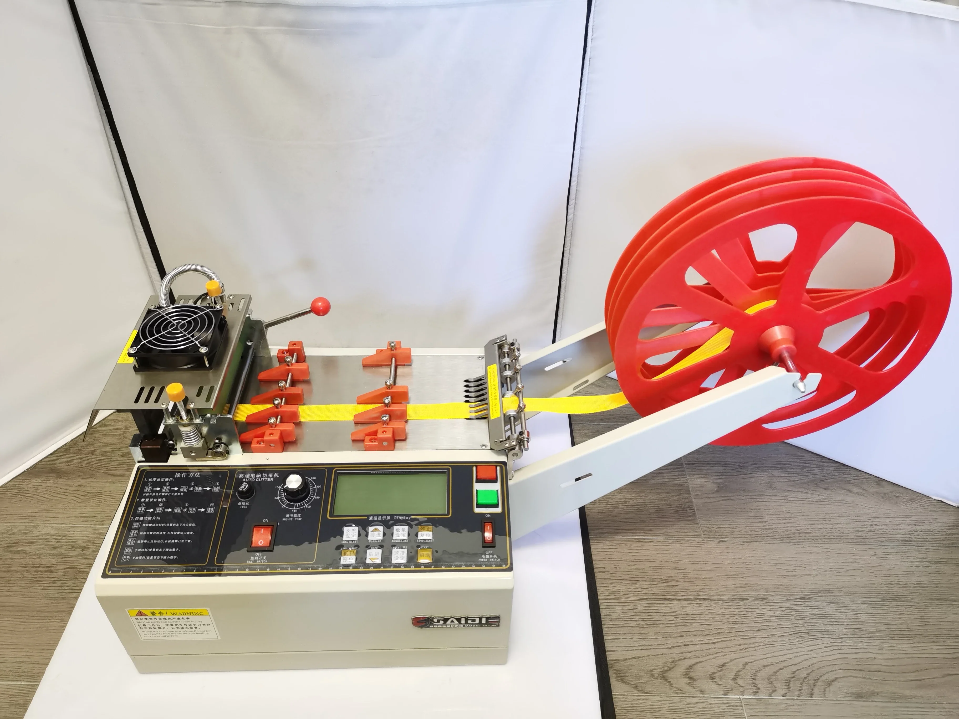 

140T Computer automatic hot and cold Cloth belt cutting machine Magic Adhesive Tape Zipper Webbing elastic band Ribbon cutter