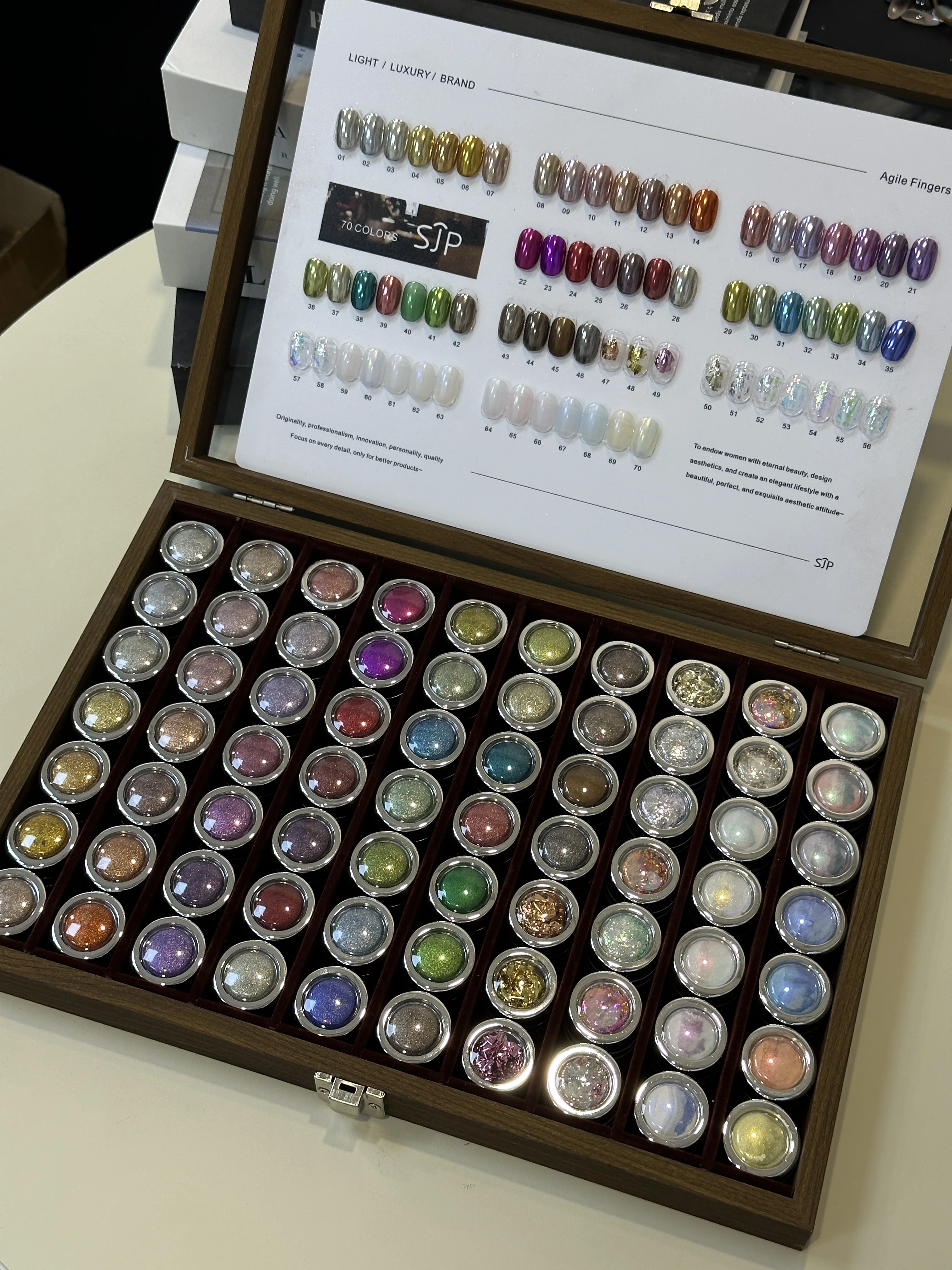 50/70color opal pink nail art set includes color swatches and a storage box.DIY nail art artistry and is a perfect gif
