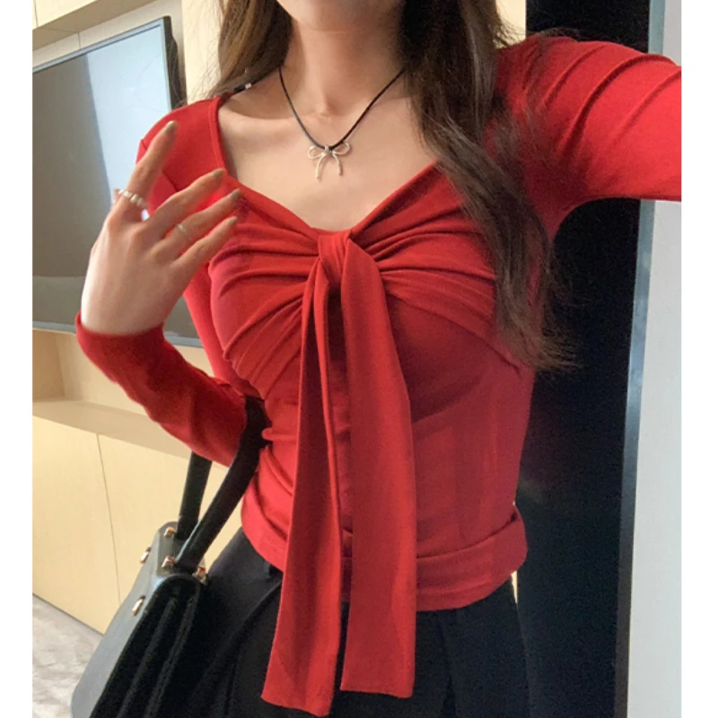 2025 nowa wiosna lato czerwona kokarda damska krótka koszulka z długim rękawem Casual koreański dół dzianinowe koszule wąskie topy kobiece