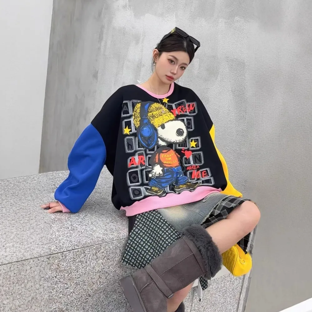 Gesplitste contrasterende trui Dames lente nieuwe schoudermouwen Leeftijdverminderende cartoon losse top met ronde hals