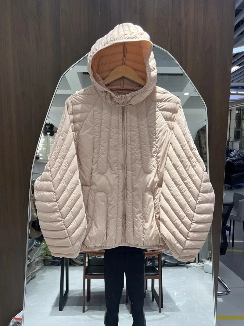 2025 秋冬新作特大ゆったり軽量ダウンジャケット女性のファッションフード付きホワイトダックダウンコート w1095