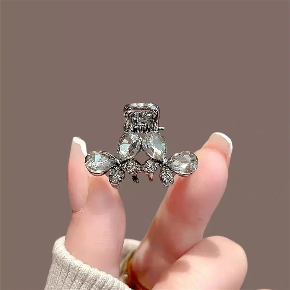 Medium Bow Knot Hair Claw Clip for Women Decorative Accessory with Teardrop Crystals and Micro Rhinestones Gunmetal Tone