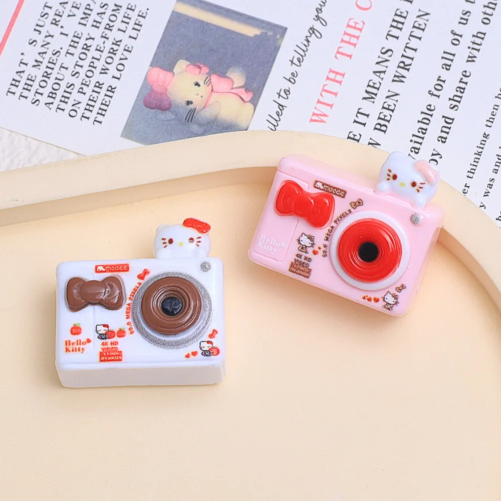 2 ชิ้น 3d Hello Kitty Series สีดํากล้อง DIY เรซิ่นอุปกรณ์เสริมเครื่องประดับ Hairpin โทรศัพท์มือถือกรณี Charm พวงกุญแจจี้วัสดุ