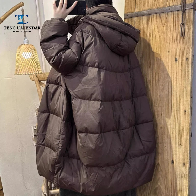 フード付きふわふわAラインダウンジャケット、ヨーロッパ風オーバーサイズゆったりホワイトダックダウン暖かいジャケット、2025年冬新作