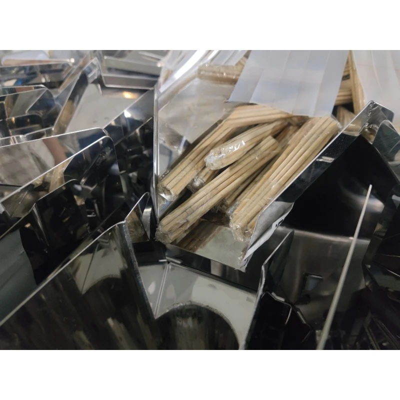 Strip material automatic feeding, weighing and packaging machine
