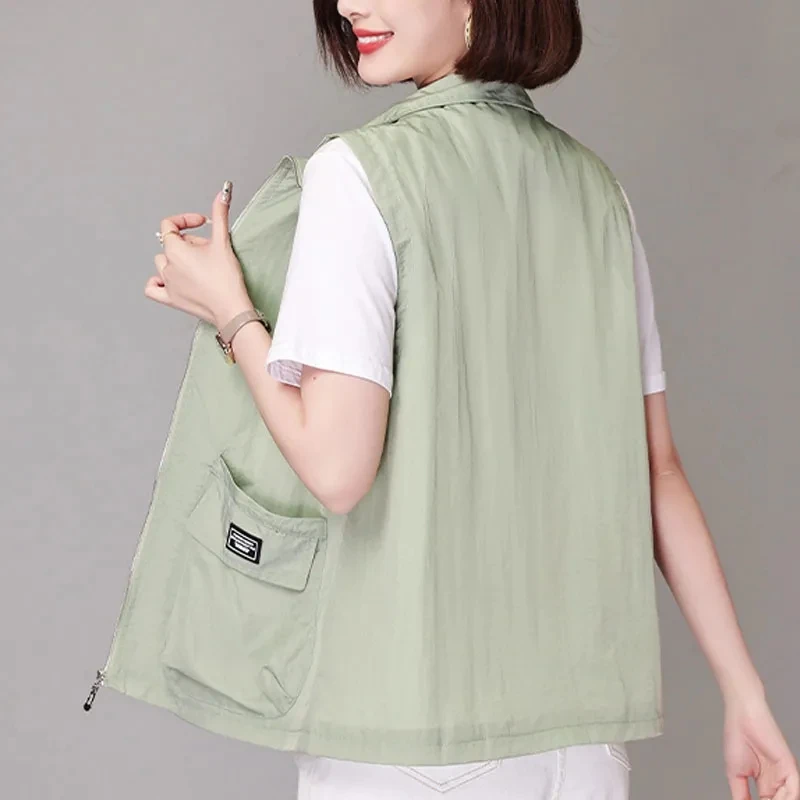 

Big Size Short Thin Waistcoat Sleeveless White Vests For Women New Outerwear Casual Loose Wear Zipper Pockets Sunscreen Vest