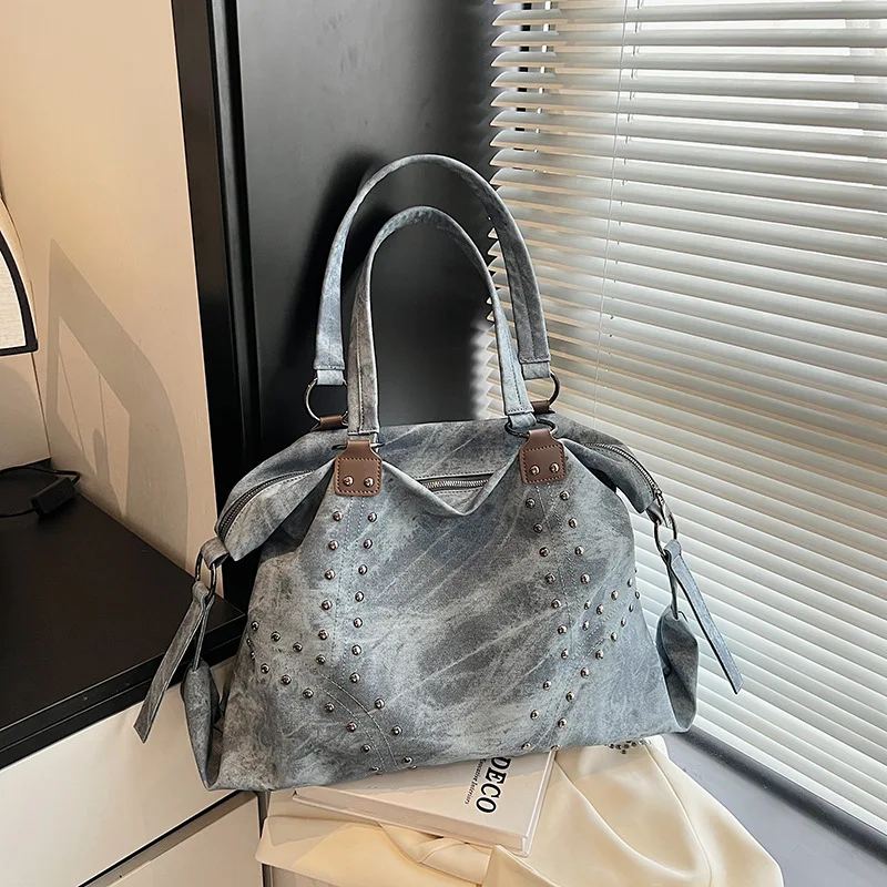 

​​Studded Luxury Rock Tote Women Premium Distressed Leather Shoulder Bag Edgy Motocross Style Gallery Opening Statement​​