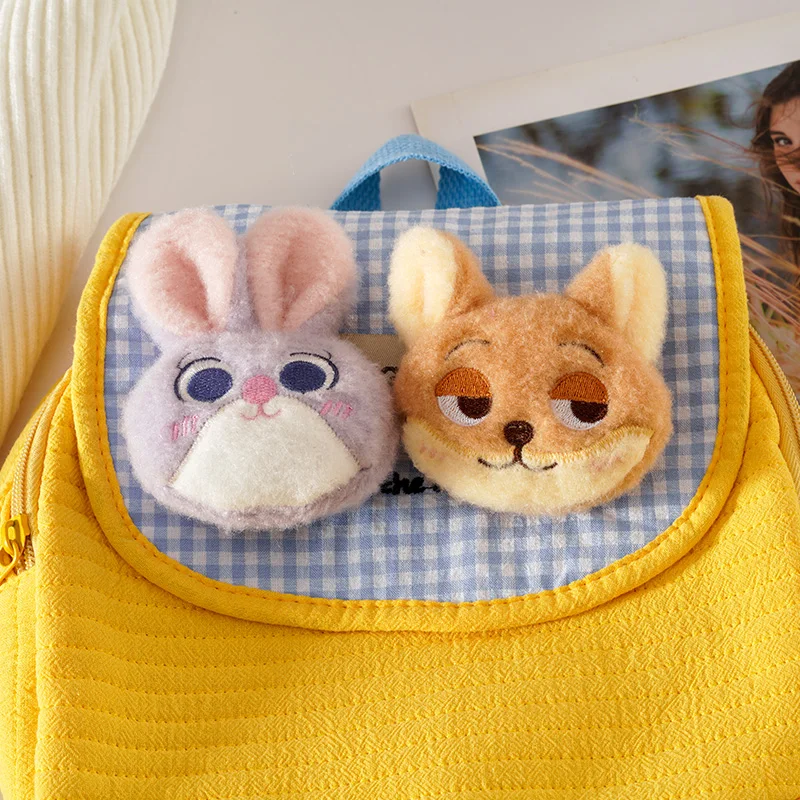 かわいいぬいぐるみキーホルダー ブローチ ジュディ 学生バッグチャーム アクセサリー ソフトトイキーリング 毛皮のような動物デザイン