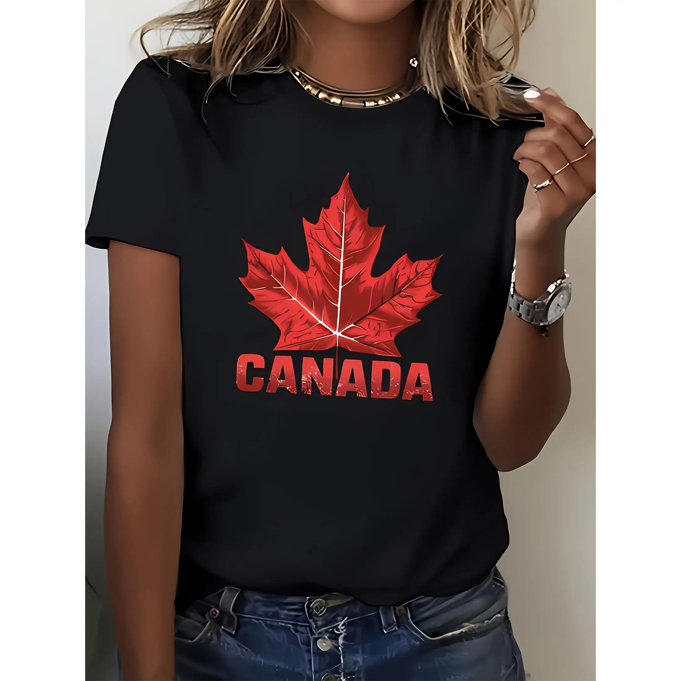 

Patriotic and Stylish T - Shirt: Showcase Canadian Pride with a Maple Leaf and "CANADA" Emblem