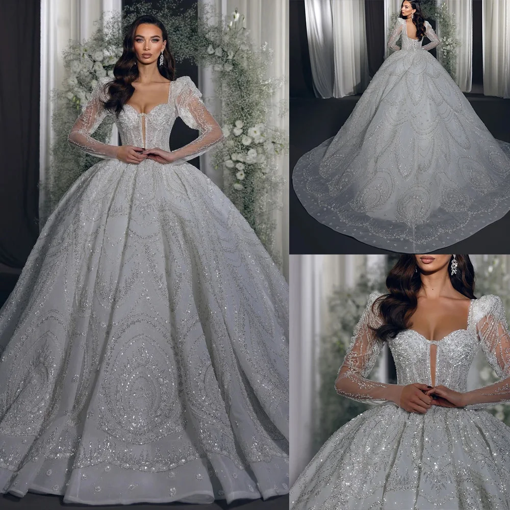 

Великолепные свадебные платья-баллоны с сексуальными аппликациями, кружевом и жемчугом, длинными рукавами и шлейфом, на заказ.