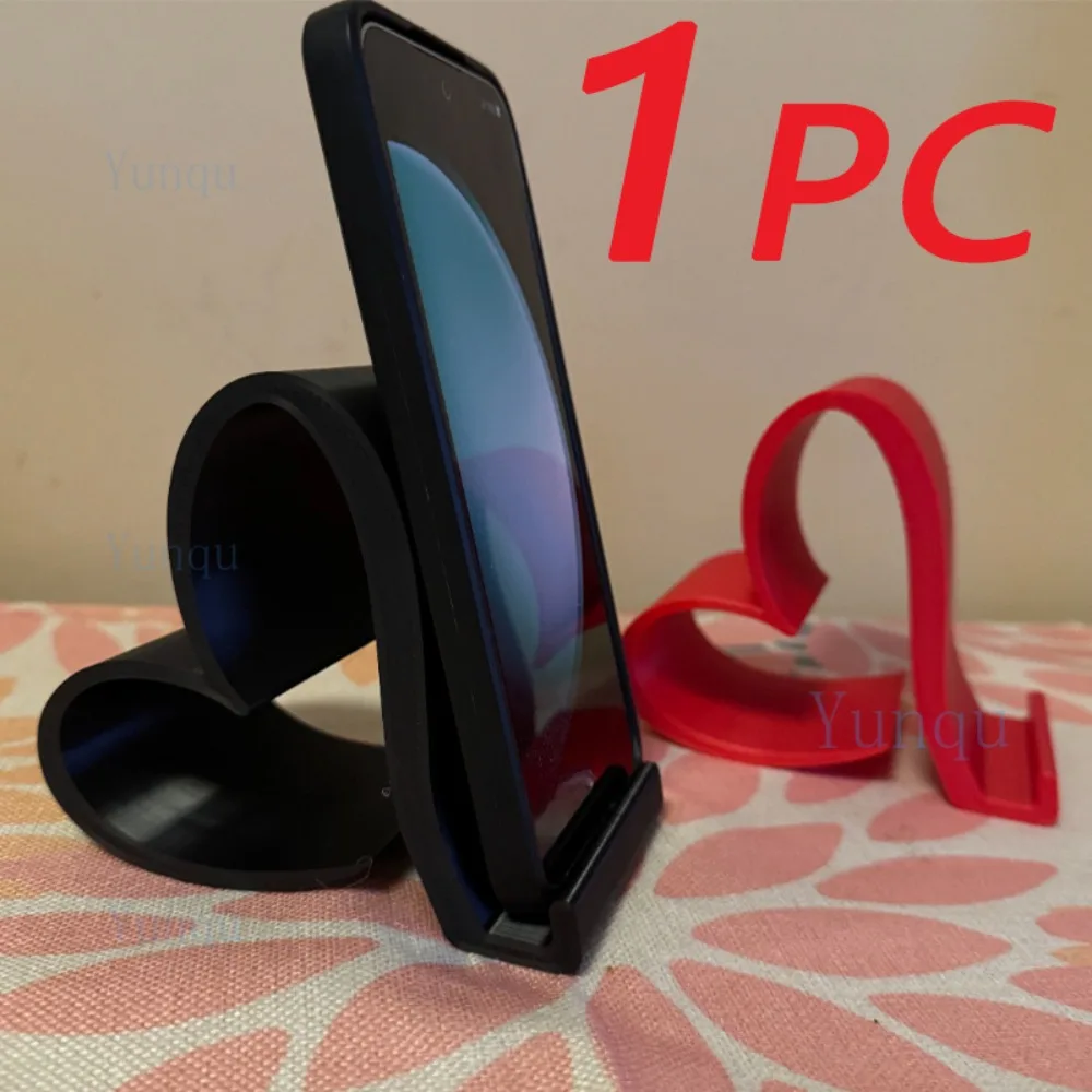 One Heart-Shaped Phone Stand, A 3D Printed Universal Phone and Tablet Stand, An Elegant Desktop Organizer in Multiple Colors