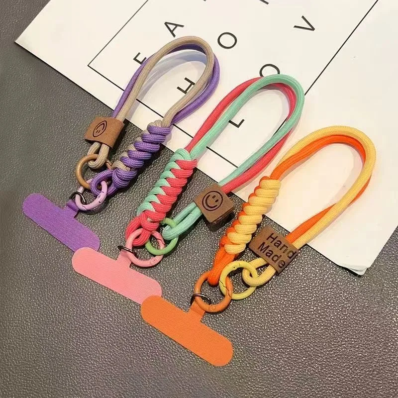 Uniwersalne etui na telefon z plecionką w kontrastowych kolorach, krótki pasek do zawieszenia, zawieszka do ręki, ochrona przed upadkiem, uniwersalna opaska na nadgarstek, modny, niszowy.